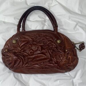 Juicy Couture Vintage Brown Shoulder Bag with Embossed Design and Rounded Shape